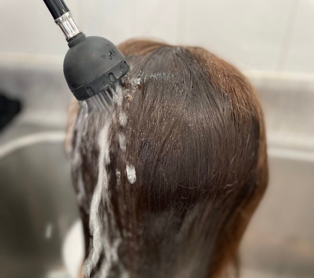 Real human hair wig being washed in wig salon