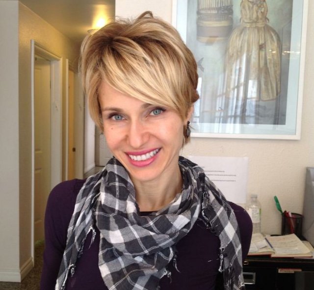 Woman wearing human hair wig with pixie cut